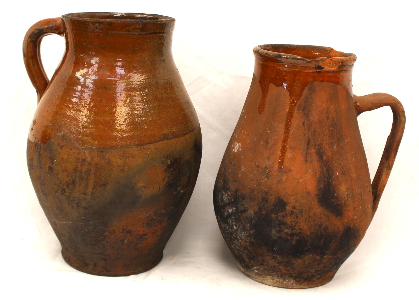Lot of 2 antique redware pitchers - 10" & 11" tall (1 of 10)