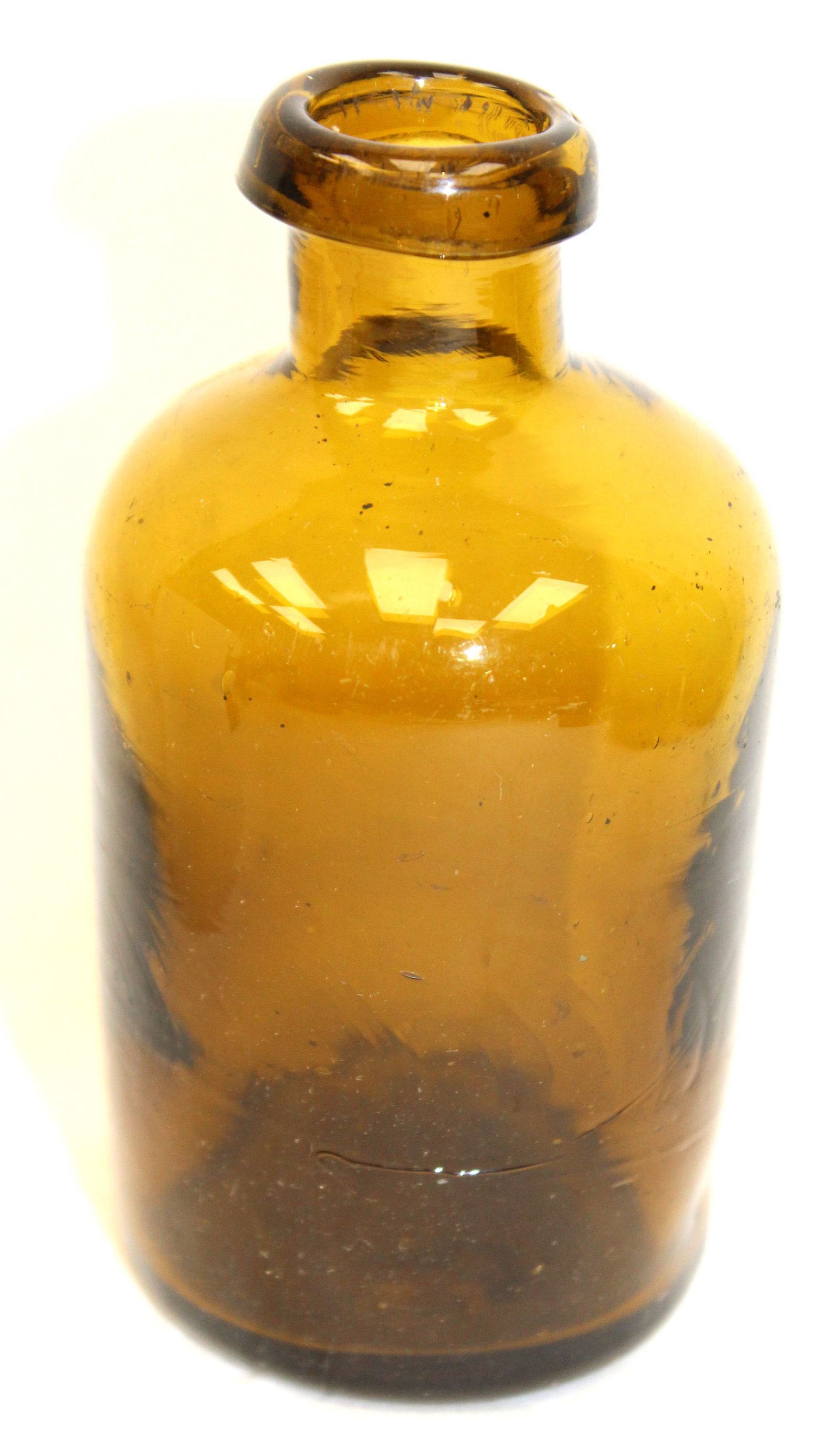 Early amber glass utility jar - 4 3/4" tall: Early amber glass utility jar - 4 3/4" tall