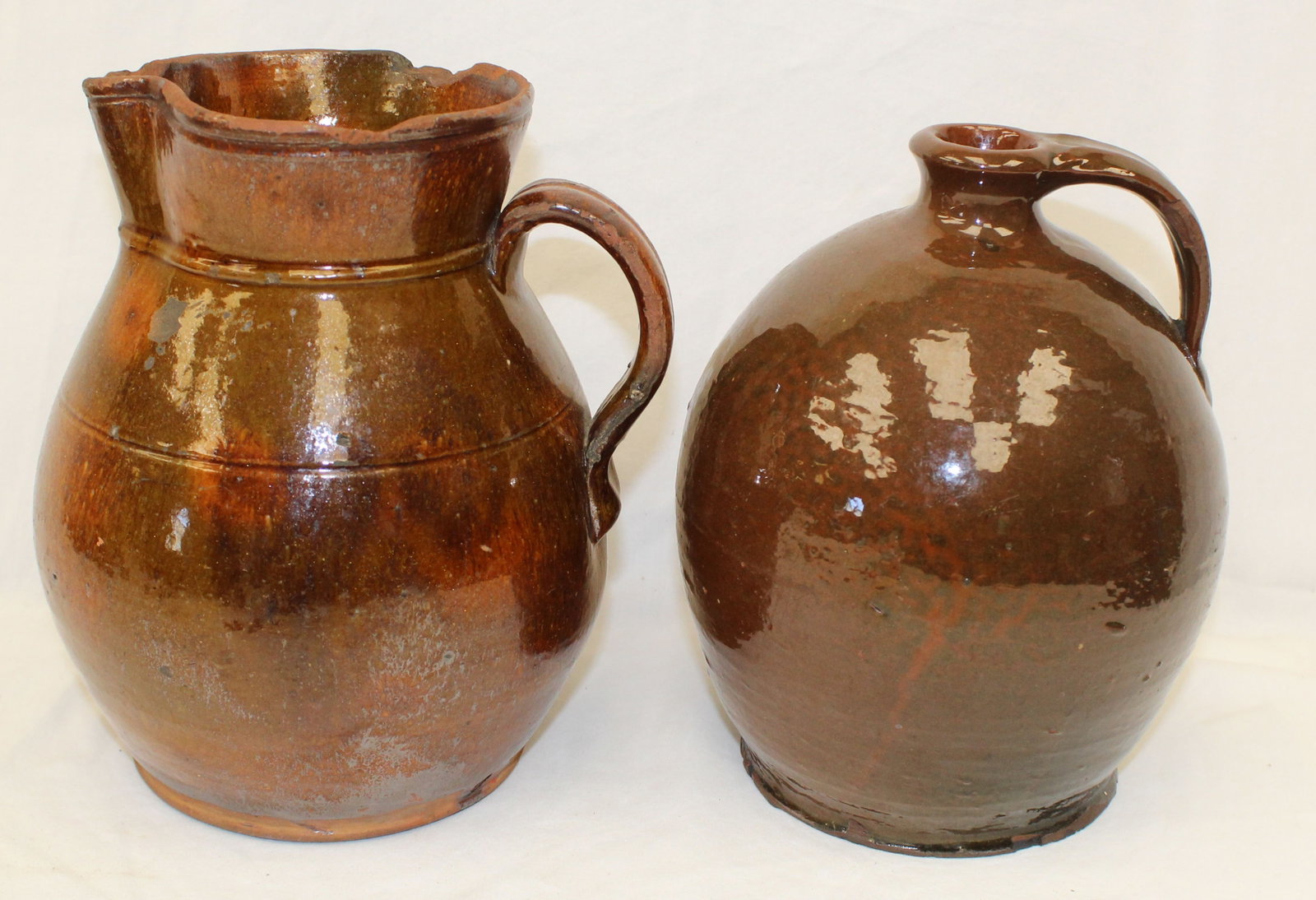 Lot of 2 antique redware items - jug & pitcher - 9" & 8 1/2" tall (1 of 10)