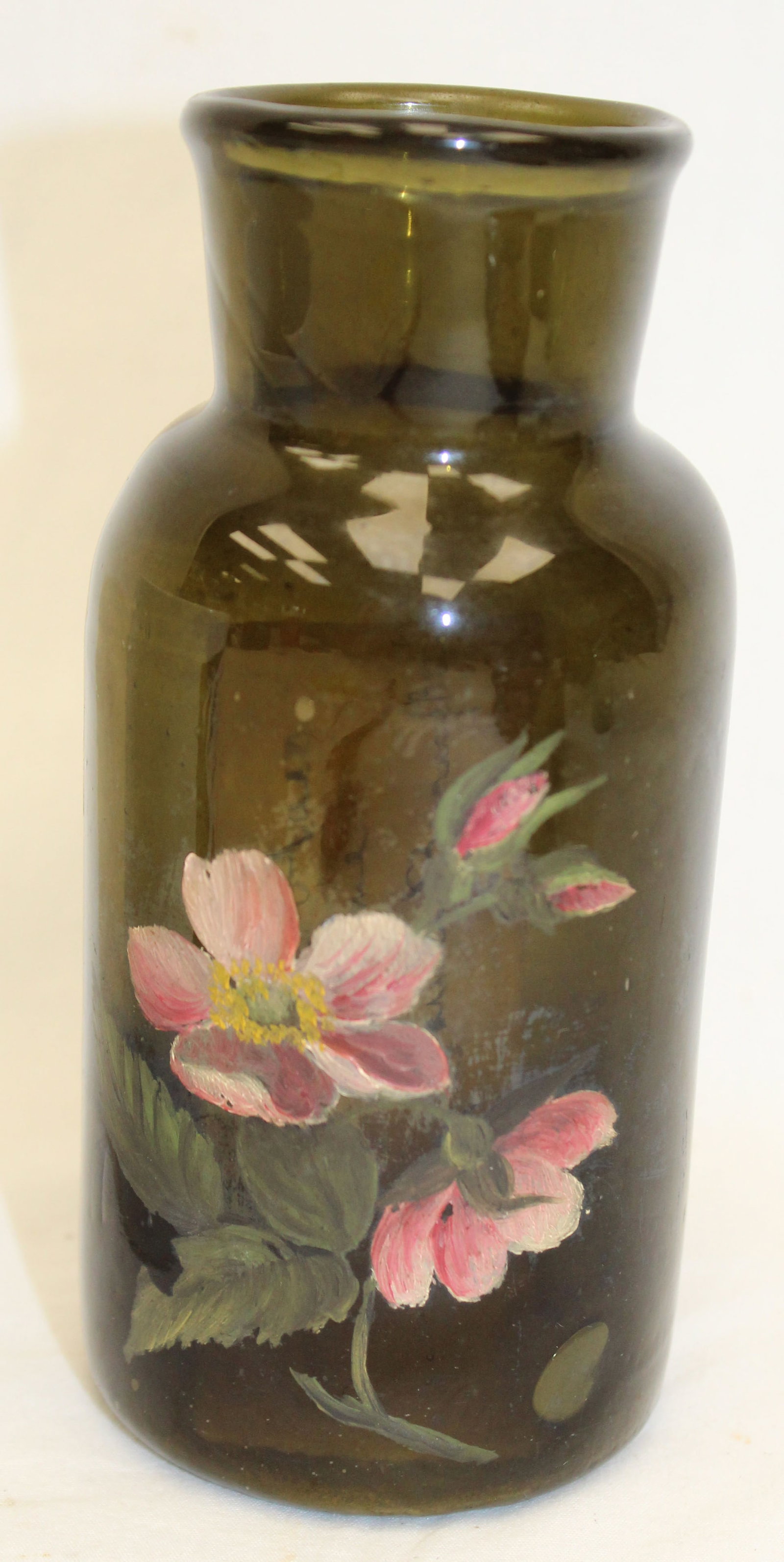 Early green glass utility jar w painted floral decoration - 5 1/2" tall