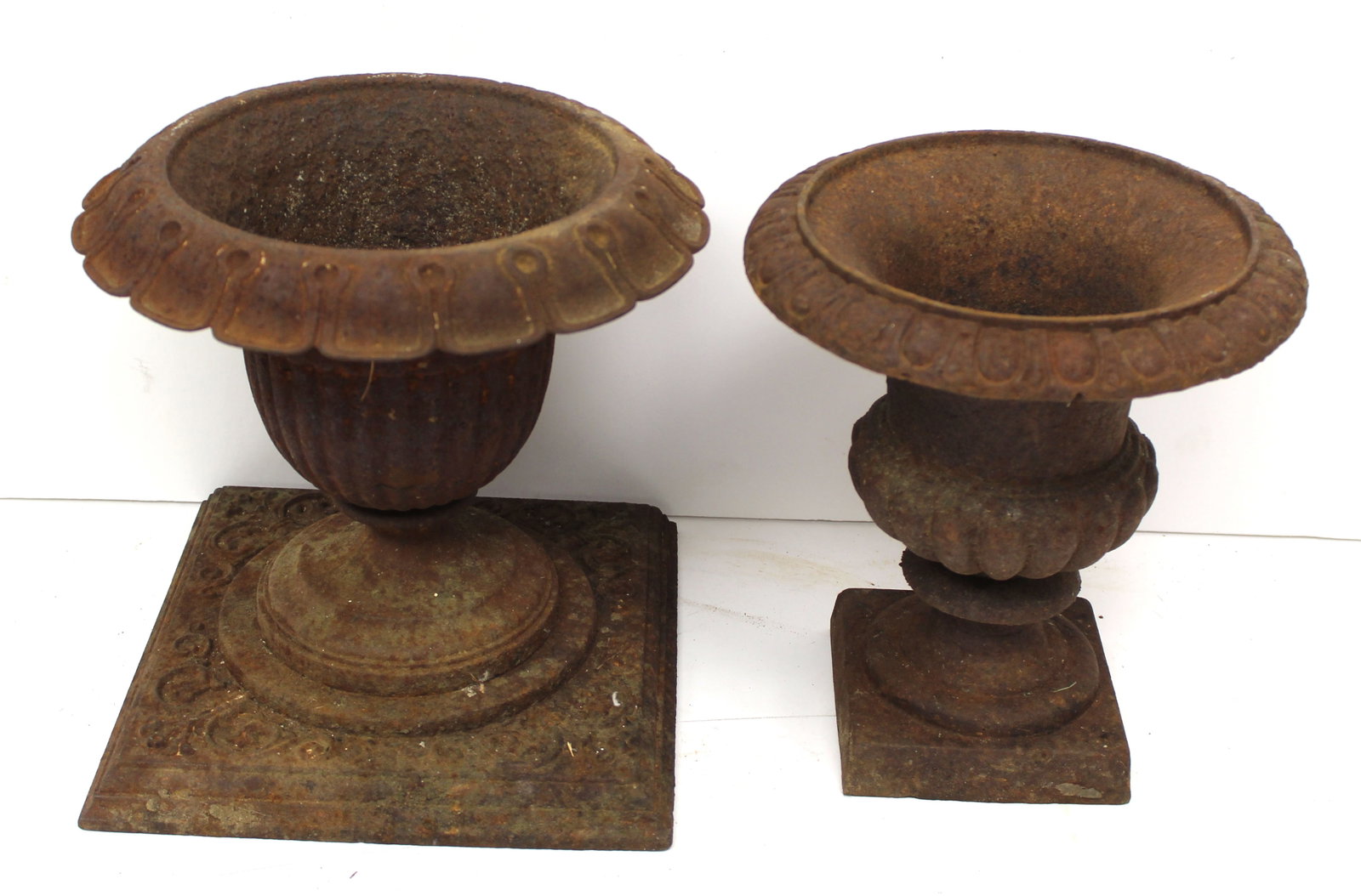 Lot of 2 antique cast iron urns - 12" x11" & 12"x8": Lot of 2 antique cast iron urns - 12" x11" & 12"x8"