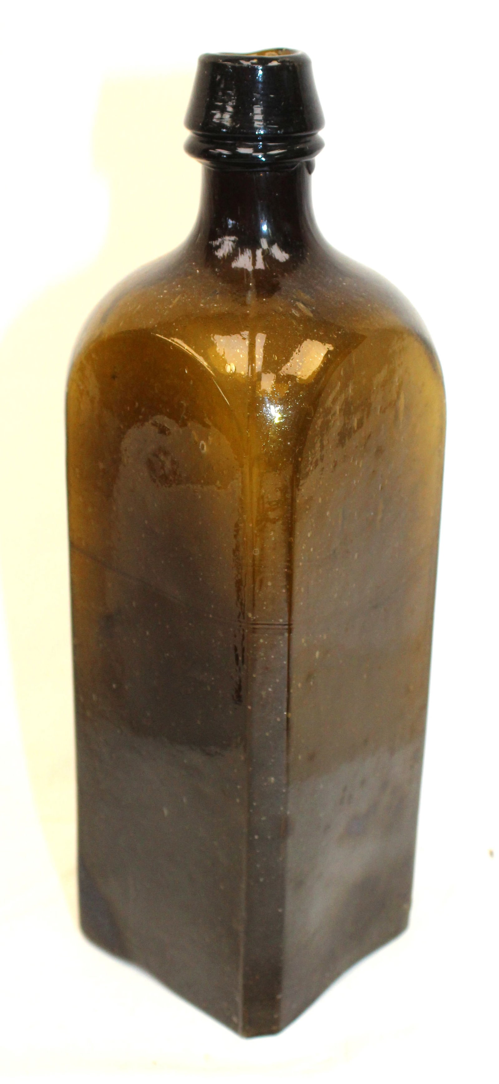 Early amber glass bottle - 9 1/2" tall: Early amber glass bottle - 9 1/2" tall