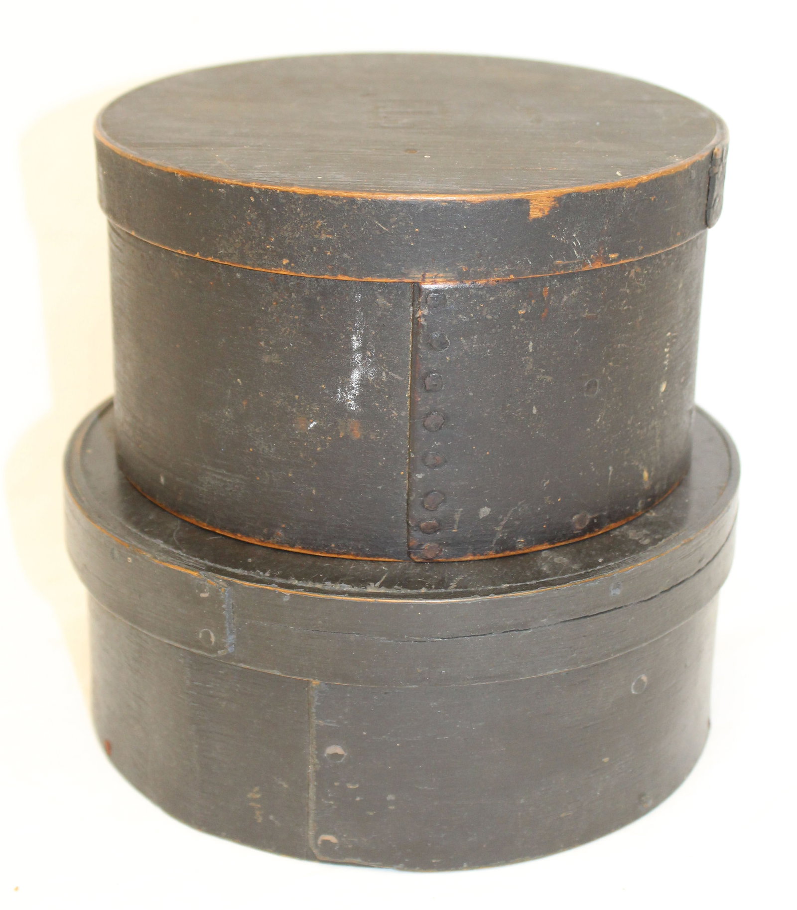 Lot of 2 antique round pantry boxes in black paint - 1 marked ST on lid - 3" x 6 1/2" diam & 3: Lot of 2 antique round pantry boxes in black paint - 1 marked ST on lid - 3" x 6 1/2" diam & 3 1/4"x6" diam