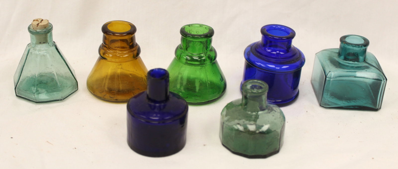 Lot of 7 antique glass inks in various forms & colors - 2" - 2 1/2" tall
