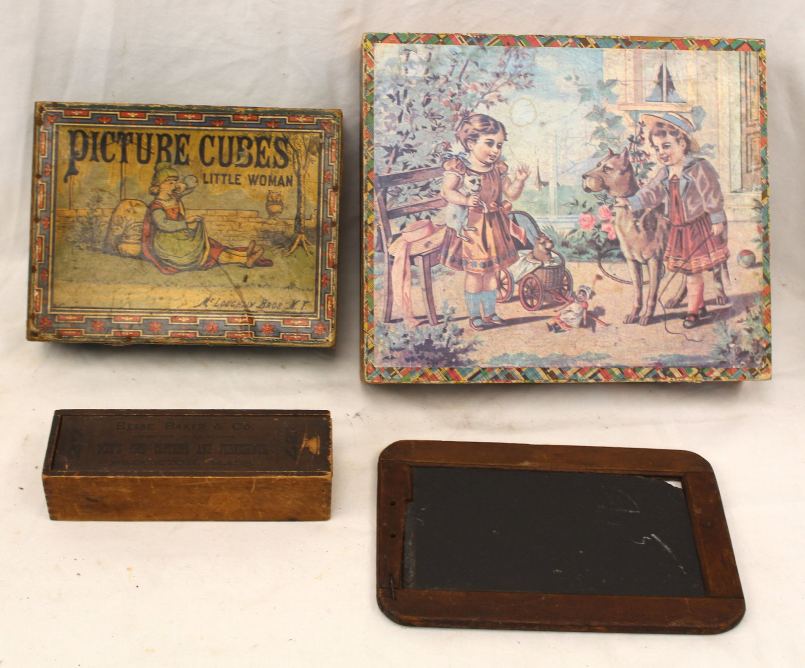 Antique children's lot incl 2 block puzzles w litho decoration in orig boxes, a slate & a slide top (1 of 7)