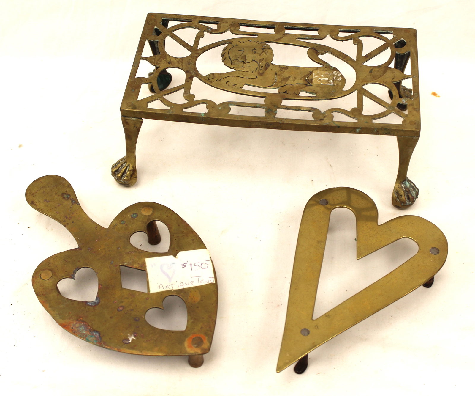 Lot of 3 antique brass items incl foptman with Lion & 2 heart shaped trivets - 8"-10" (1 of 6)