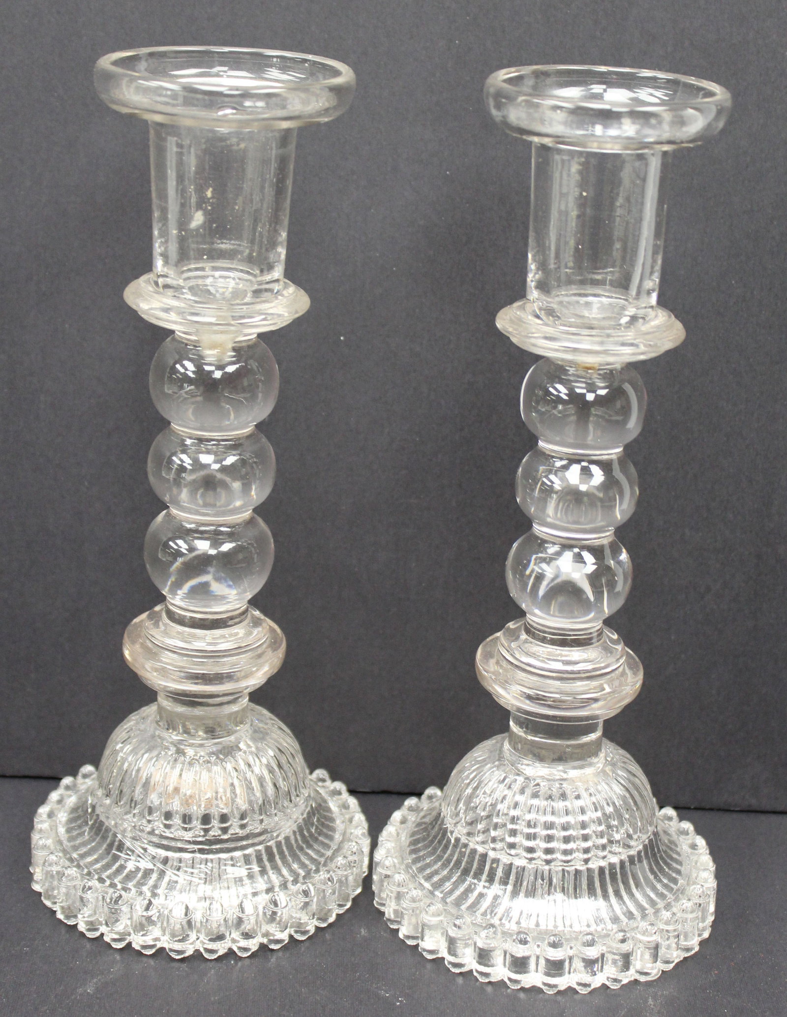 Pair of clear glass turned candlesticks - 9 1/2" tall: Pair of clear glass turned candlesticks - 9 1/2" tall