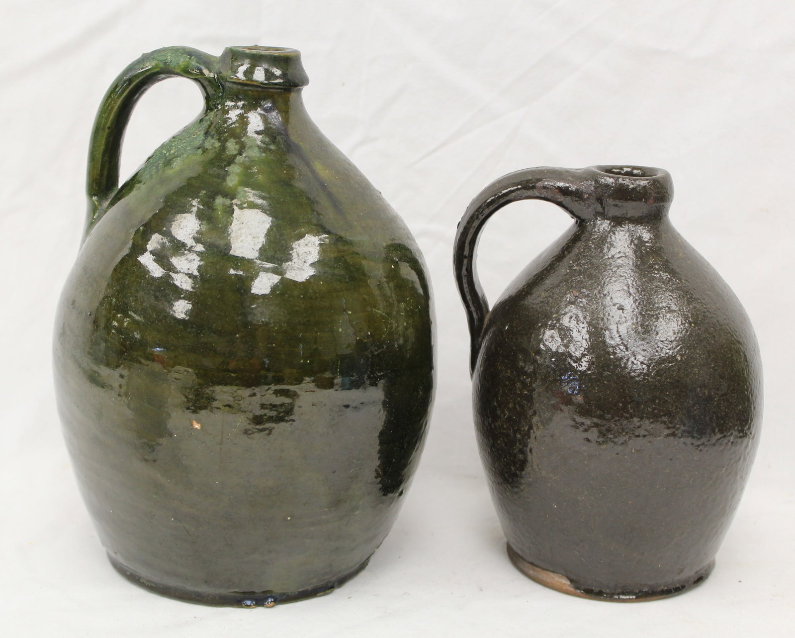 Lot of 2 antique redware jugs incl 1 in green glaze - 6 1/2" & 9" tall (1 of 8)