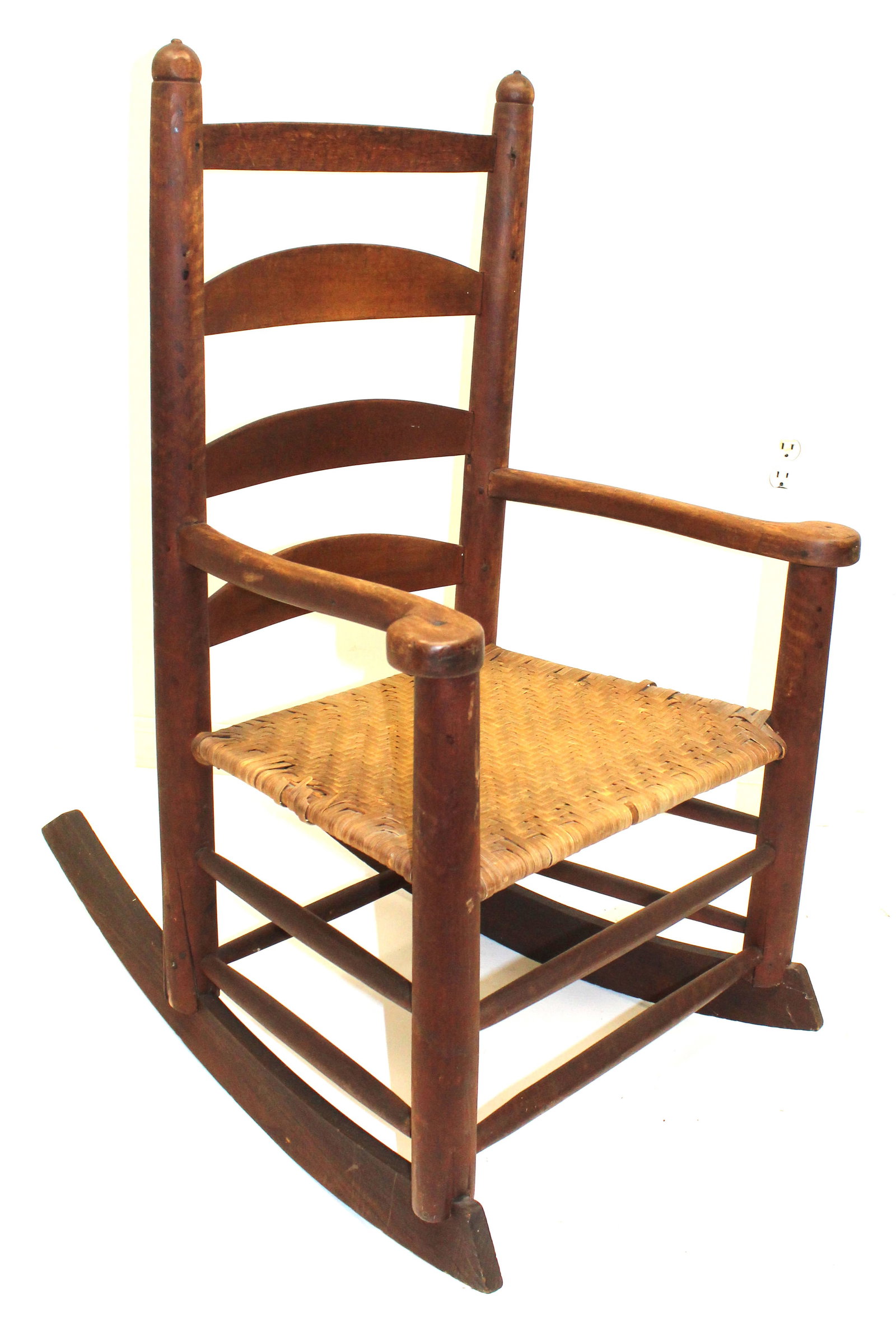 Antique ladderback rocking armchair in red paint w splint seat - 38" tall w 16 1/2" seat height (1 of 7)