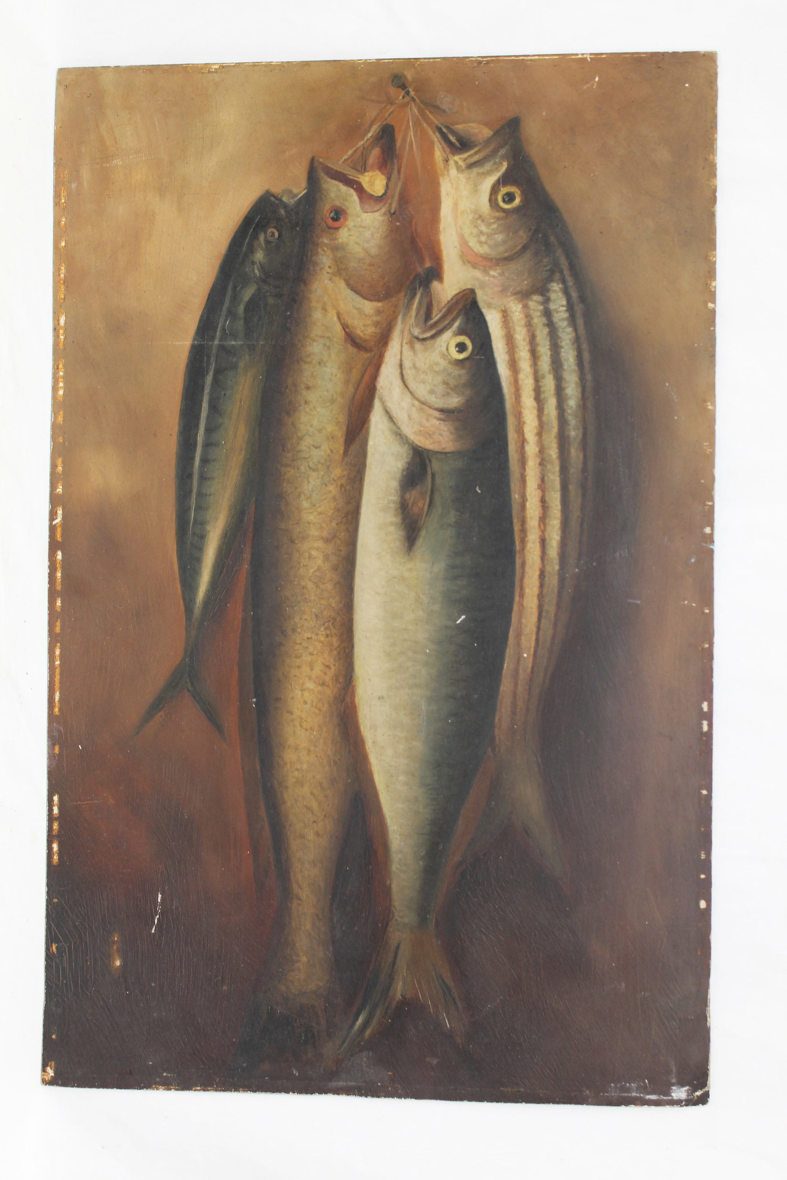 Unframed o/bd of fish hanging from a nail - unframed 24 1/4"x15 3/4"