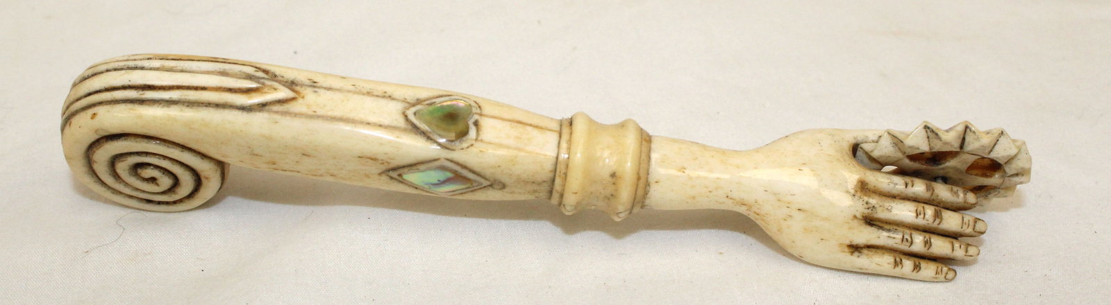 Antique bone pie crimper w hand motif - 6 1/2" long: Antique bone pie crimper w hand motif - 6 1/2" long
