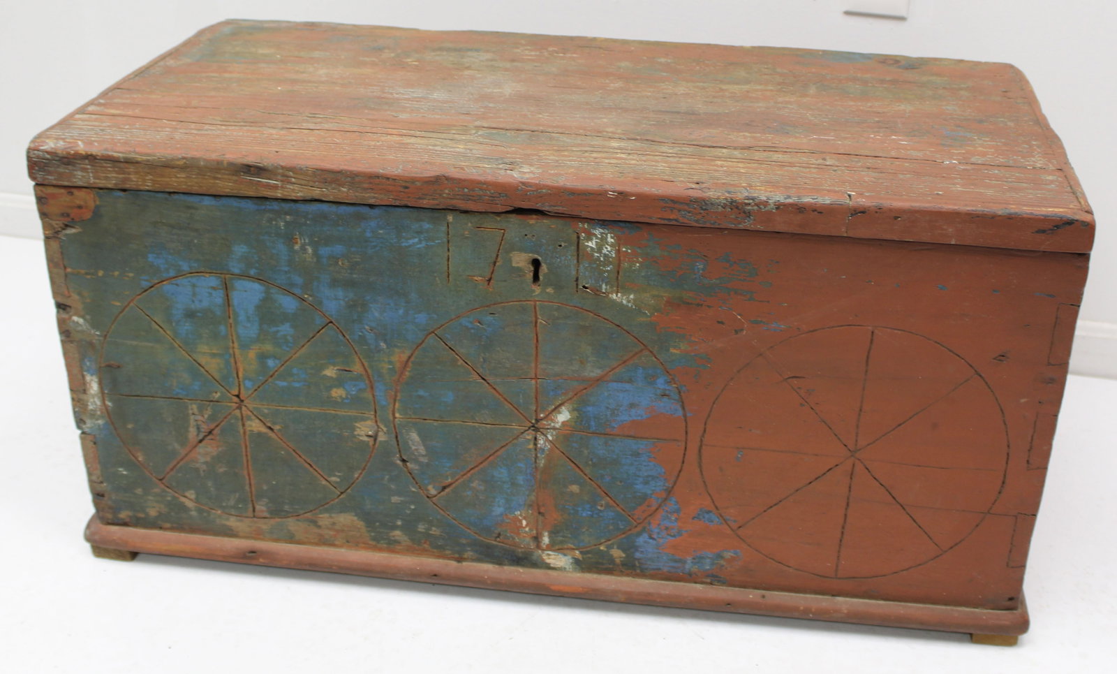 Antique blanket chest in red & blue paint w carved decoration on front - 18" tall x 37"x18 1/2": Antique blanket chest in red & blue paint w carved decoration on front - 18" tall x 37"x18 1/2"