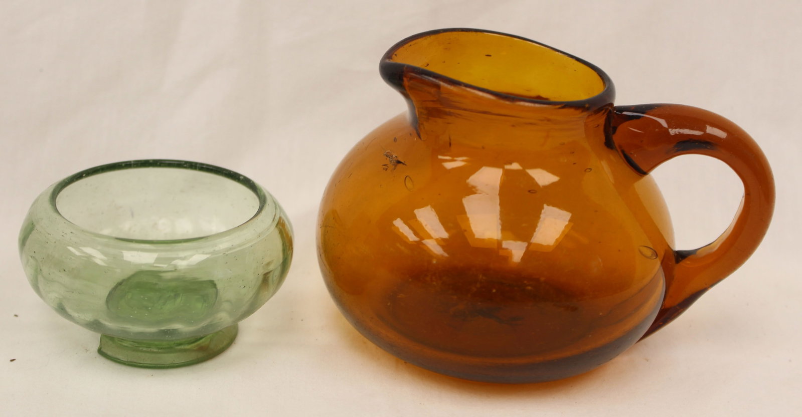 Lot of 2 antique glass items - amber creamer & aqua salt/sm bowl - 1 3/4" tall x 3" diam & 3" tall (1 of 10)