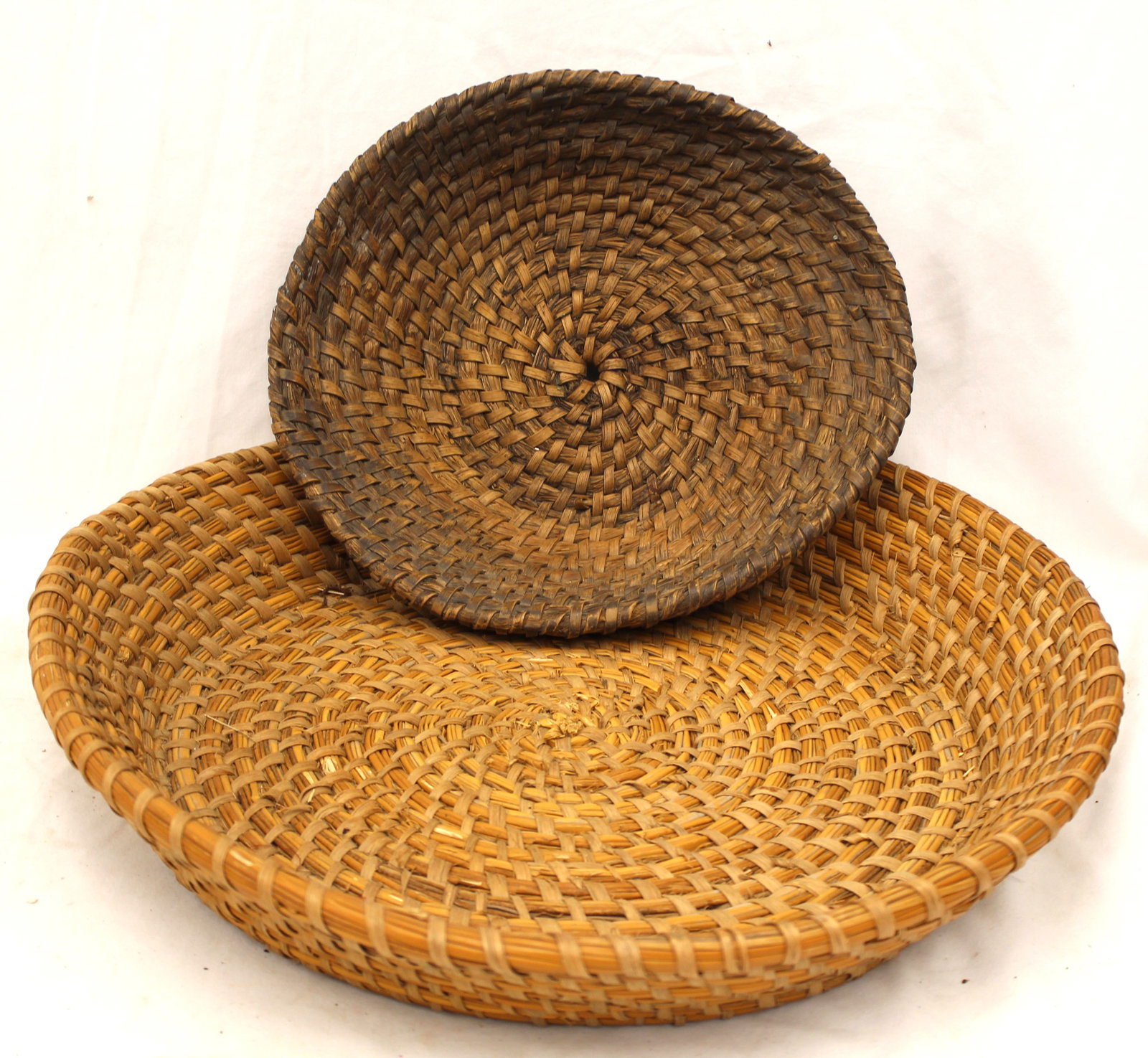 Lot of 2 antique rye baskets - 13" & 19" diam: Lot of 2 antique rye baskets - 13" & 19" diam
