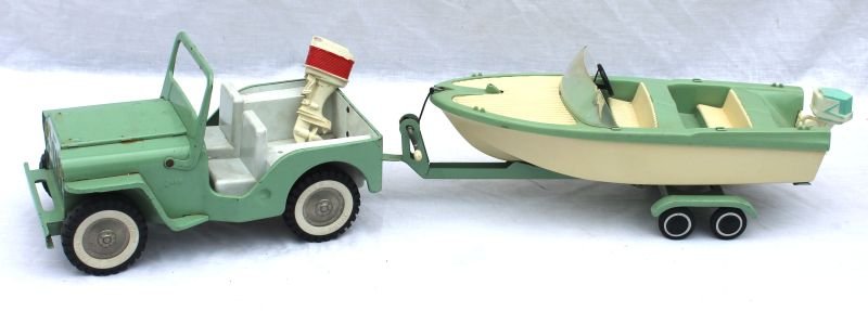 fine 1964 Tonka mint green jeep run-about #516 w: fine 1964 Tonka mint green jeep run-about #516 w "Clipper" boat w orig tethered box "Buddy L" motor - 23 1/2" long