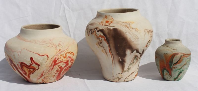 lot of 3 sgnd Nemadji colorful swirled pottery vases: lot of 3 sgnd Nemadji colorful swirled pottery vases (Made in Minnesota from 1923-2002 Using Native American inspired designs) - 3" - 5 1/2"