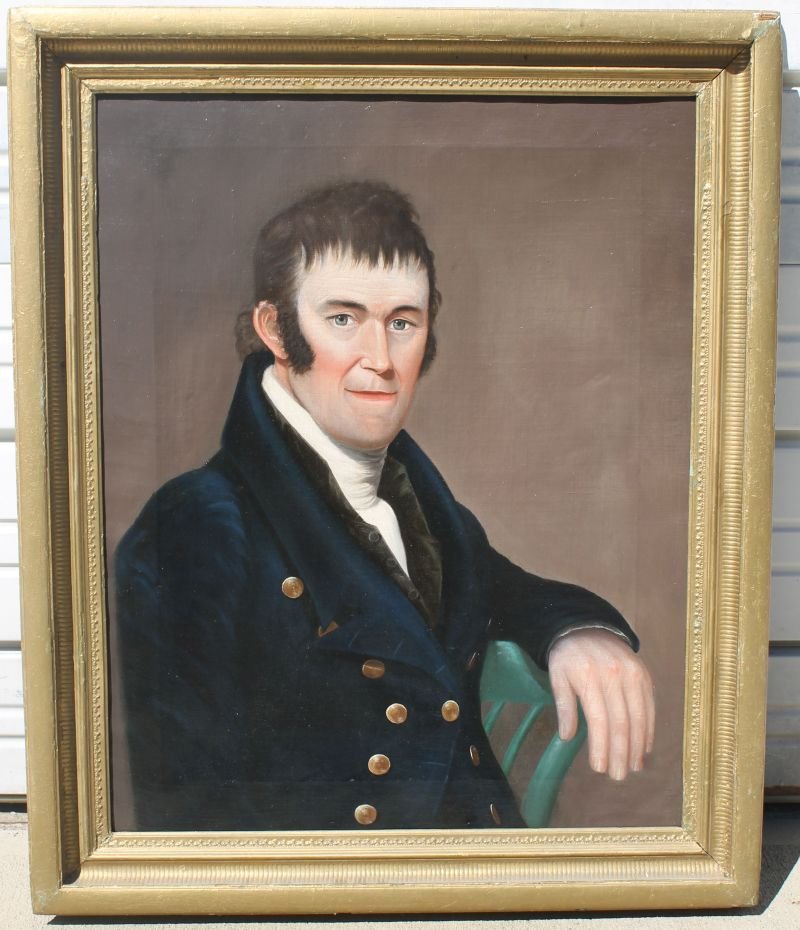 mid 19thC 30"x24" o/c portrait of a gentleman in coat w: mid 19thC 30"x24" o/c portrait of a gentleman in coat w brass buttons w hand resting on chair back -identified as Isaac Lowe on stretcher - vintage frame & stretcher