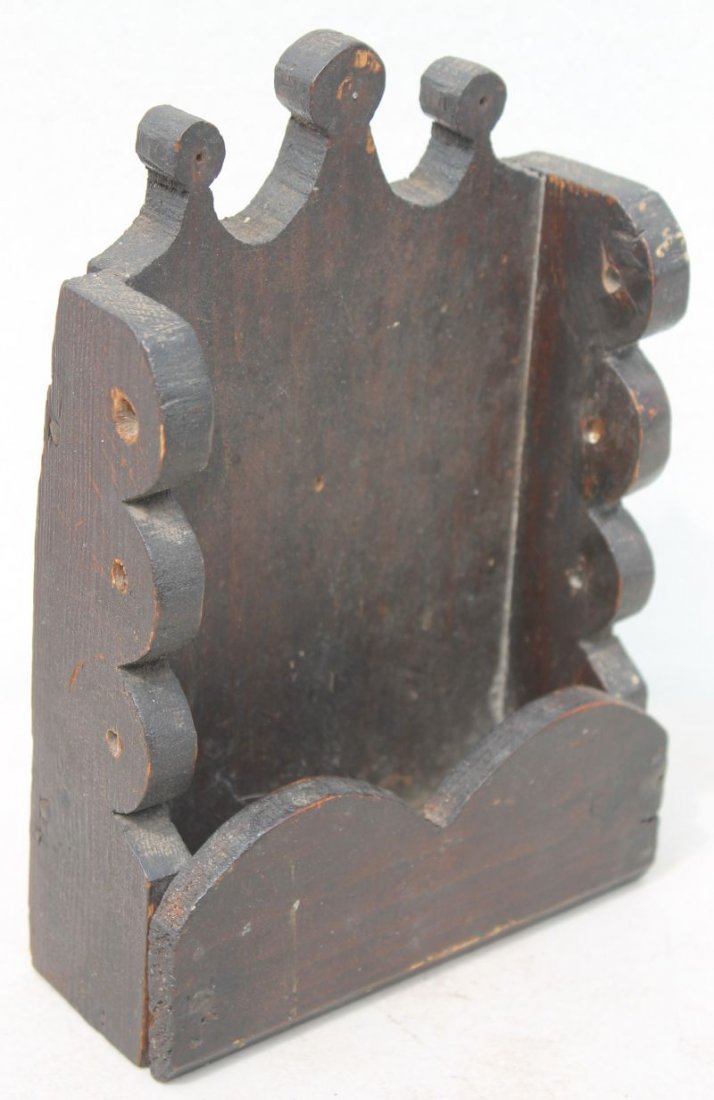 ca 1820 tiny vigorously turned Maine pine carved: ca 1820 tiny vigorously turned Maine pine carved wallbox in great graphic form w lobed shaped sides, tombstone pocket & triple lollipop crest, probably orig used to hold a weaver's spools in orig Span