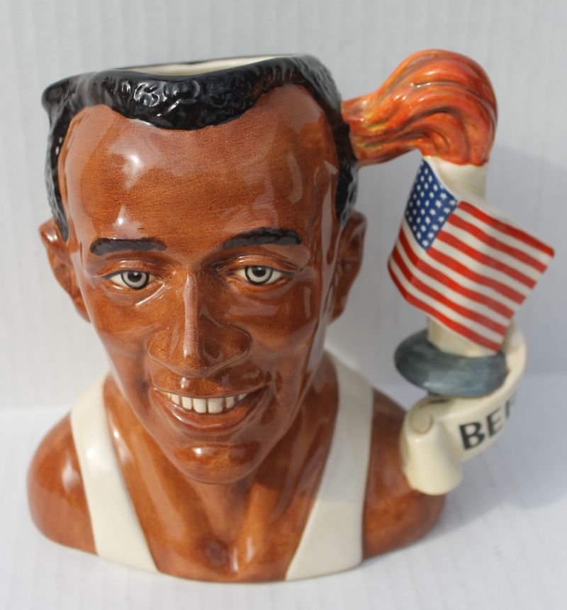 Royal Doulton toby jug D7019 "Jesse Owens" - 7" tall Pr: Royal Doulton toby jug D7019 "Jesse Owens" - 7" tall Provenance: from a prominent local African American collection