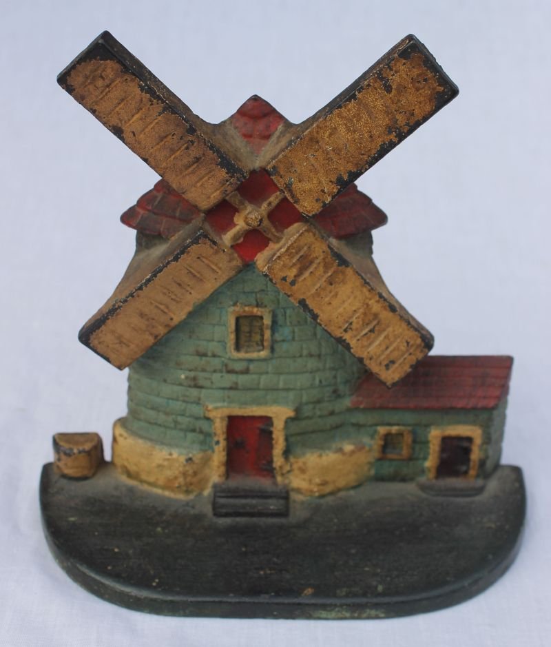 antique cast iron doorstop "Windmill" (w well) by: antique cast iron doorstop "Windmill" (w well) by National Foundry - 7 1/4" tall - pictured in "Figurative Cast Iron" book