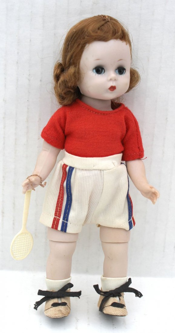 ca 1963 Alexanderkins hard palstic, bent knee walker in: ca 1963 Alexanderkins hard palstic, bent knee walker in Tennis outfit w racquet marked "Alex" - saran wig in orig set, orig outfit - 8" tall