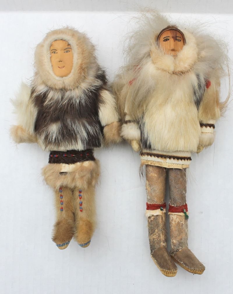 pair of all orig Eskimo dolls w wooden heads, leather: pair of all orig Eskimo dolls w wooden heads, leather limbs in hide/fur clothing w beadwork - all orig - 9" & 10"