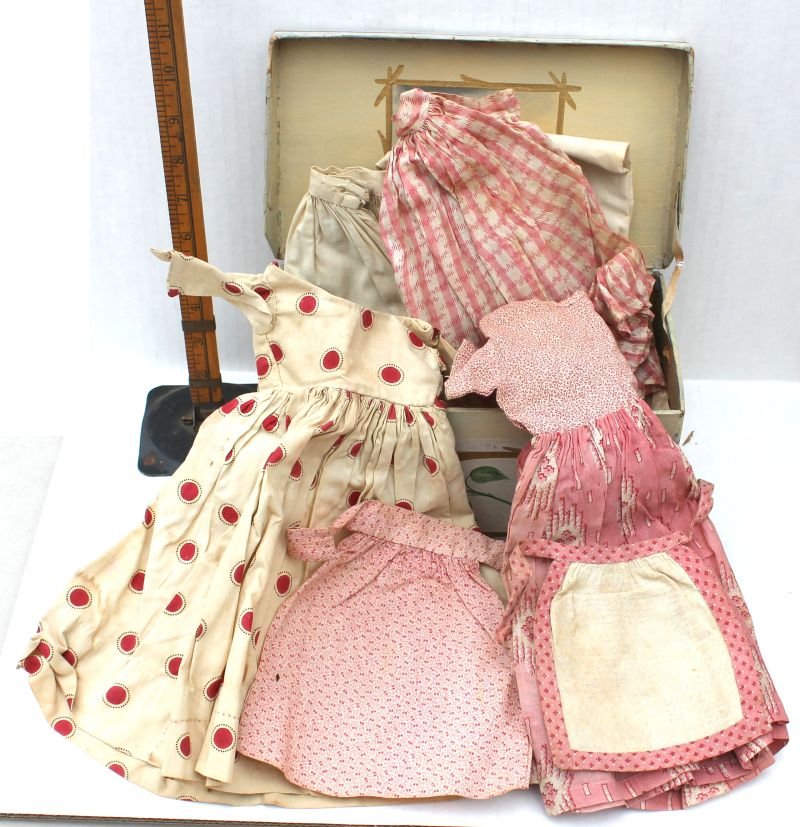 Great 19thC home made hand painted cardboard trunk w: Great 19thC home made hand painted cardboard trunk w assortment of antique doll clothing for a china doll - box as is - dimensions of box are 9 3/4" wide x 5 3/4" deep x 4 1/2" tall