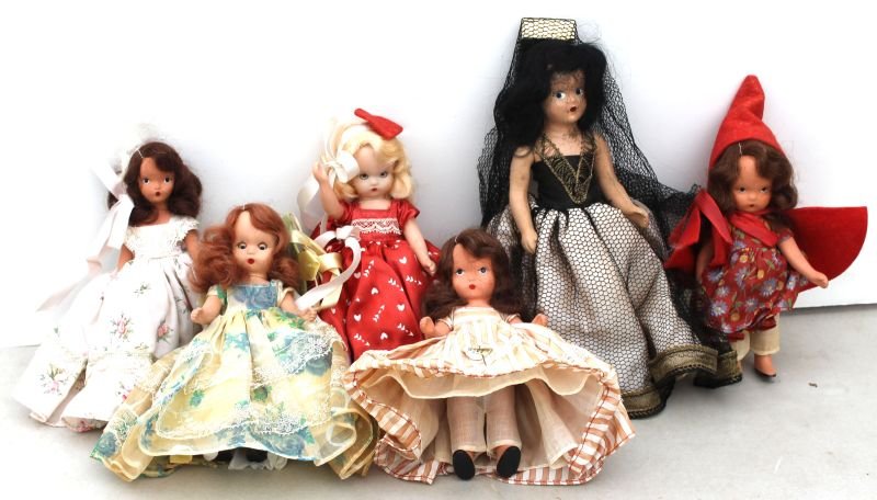ca 1930's-40's lot of 6 painted bisque & plastic Nancy: ca 1930's-40's lot of 6 painted bisque & plastic Nancy Ann Storybook dolls - 5 1/2" - 8" tall