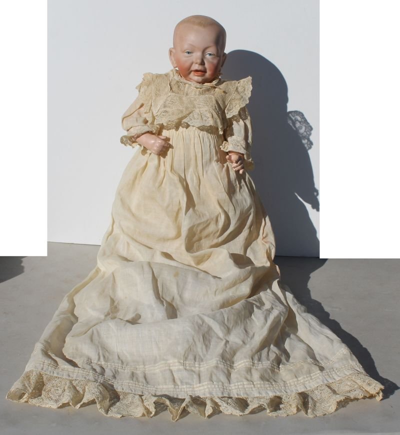 ca 1915 Kammer & Reinhardt bisque head character baby: ca 1915 Kammer & Reinhardt bisque head character baby doll on bent limb baby body (unmarked) w intaglio eyes open/closed mouth w tongue - suitably dressed in long baby dress w 2 petticoats & booties -