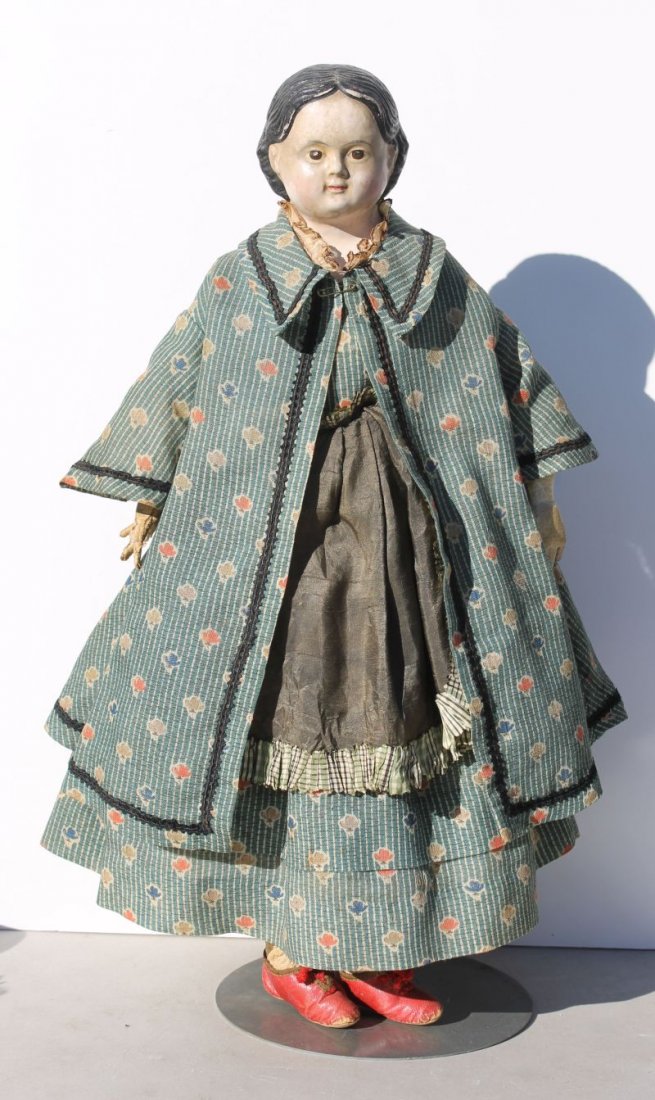 ca 1850-70 German attrib Greiner (evidence of missing: ca 1850-70 German attrib Greiner (evidence of missing label) papier mache head doll w leather arms & cloth legs - beautifully dressed in her orig ensemble w red leather shoes - sgnd note attached w pr