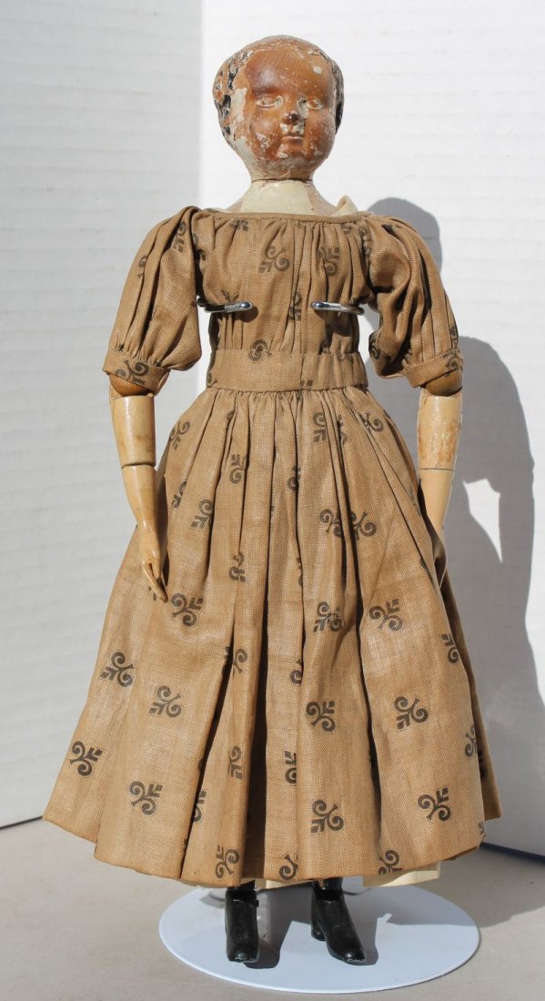 ca 1870 Joel Ellis type wooden doll w metal hands &: ca 1870 Joel Ellis type wooden doll w metal hands & feet (black boots, remains of molded black painted hair & very white skin) & stationary head in appropriate antique clothing - (as is) 12 1/2" tall