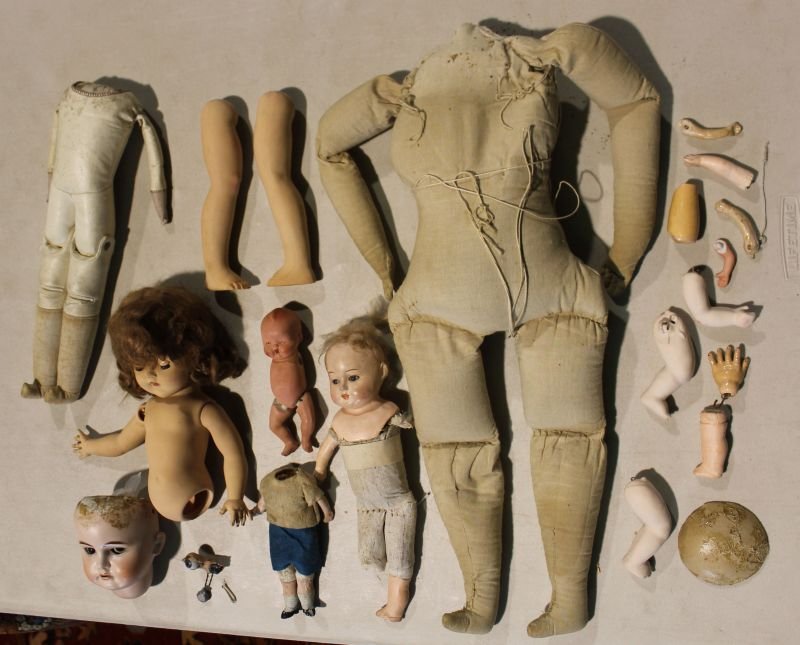 large assorted lot of ca 1890-1950 doll parts & hats: large assorted lot of ca 1890-1950 doll parts & hats incl kid body, bisque head, composition bodies, hard plastic parts
