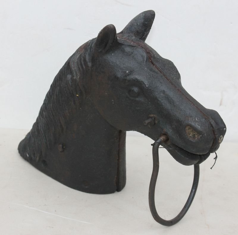 19thC large cast iron horse head hitching post - 12": 19thC large cast iron horse head hitching post - 12" tall - Note: because of the large size, there was speculation that this may have actually come from a carnival ride (was in use as a hitching post)