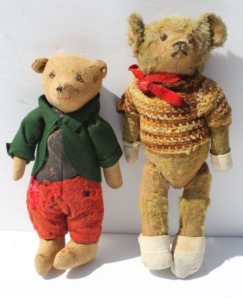 2 antique jointed American teddy bears in old clothing: 2 antique jointed American teddy bears in old clothing - a 14" mohair w glass eyes & a 12" wool w shoe button eyes