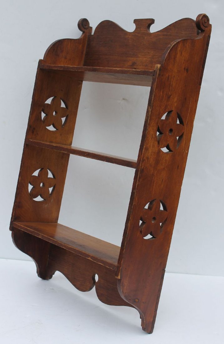 wonderful mid 19thC folk art carved hanging shelves w: wonderful mid 19thC folk art carved hanging shelves w violin type scrolls, pinwheel side cut outs & scrolled crest & bottom - 28 1/4" tall x 16" wide x 6" deep