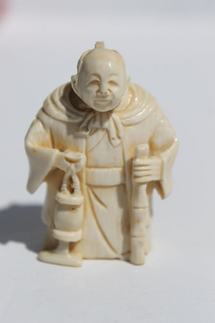 Asian carved ivory netsuke of a man w a lantern - 2": Asian carved ivory netsuke of a man w a lantern - 2"