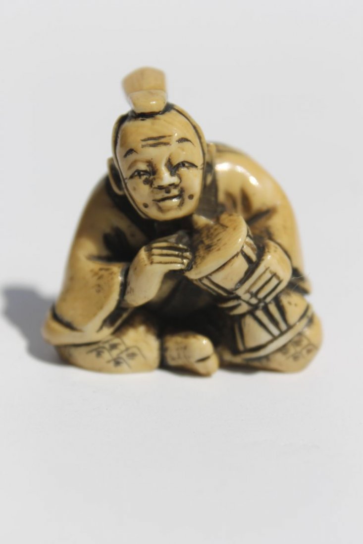 Asian carved ivory netsuke of a man playing a drum - 1: Asian carved ivory netsuke of a man playing a drum - 1 1/2" - sgnd