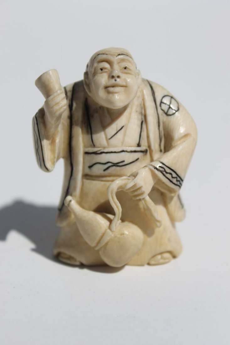 Asian carved ivory netsuke of a man w gourd - 2" - sgnd: Asian carved ivory netsuke of a man w gourd - 2" - sgnd