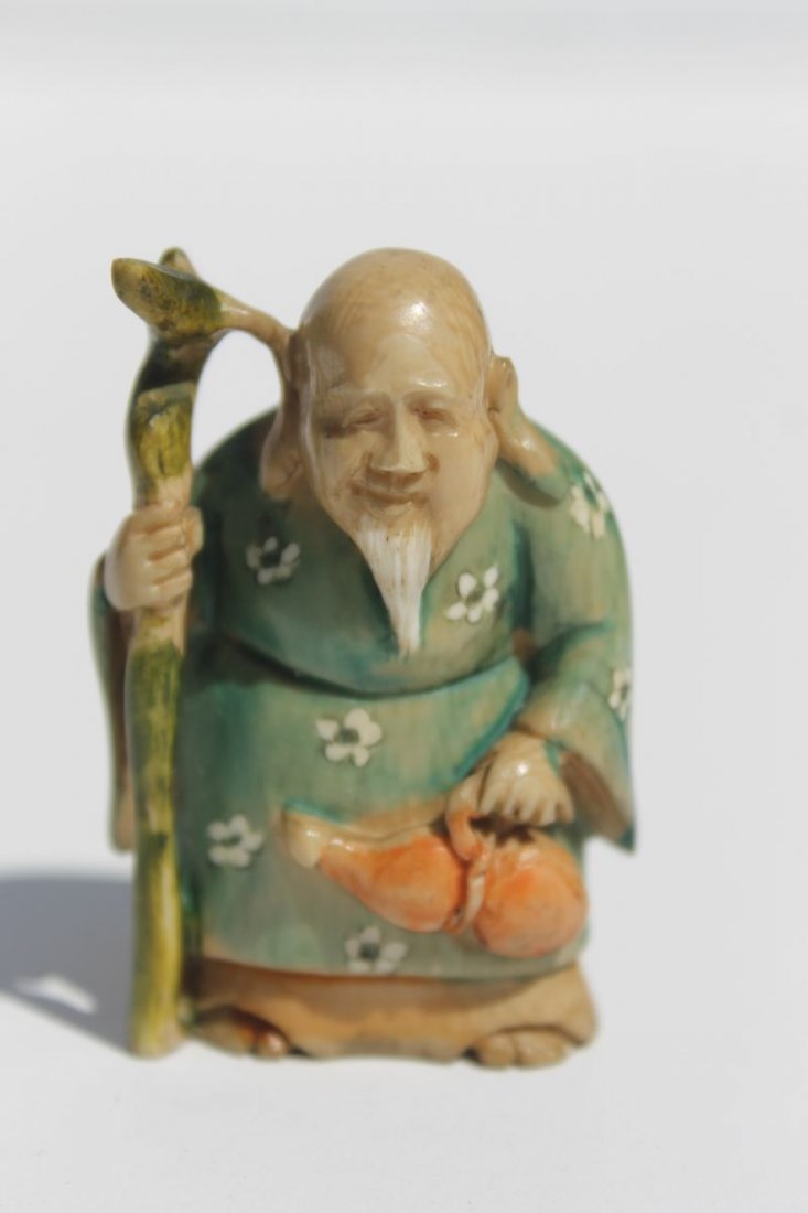 Asian carved painted ivory netsuke of a man w guord -: Asian carved painted ivory netsuke of a man w guord - 2" - sgnd