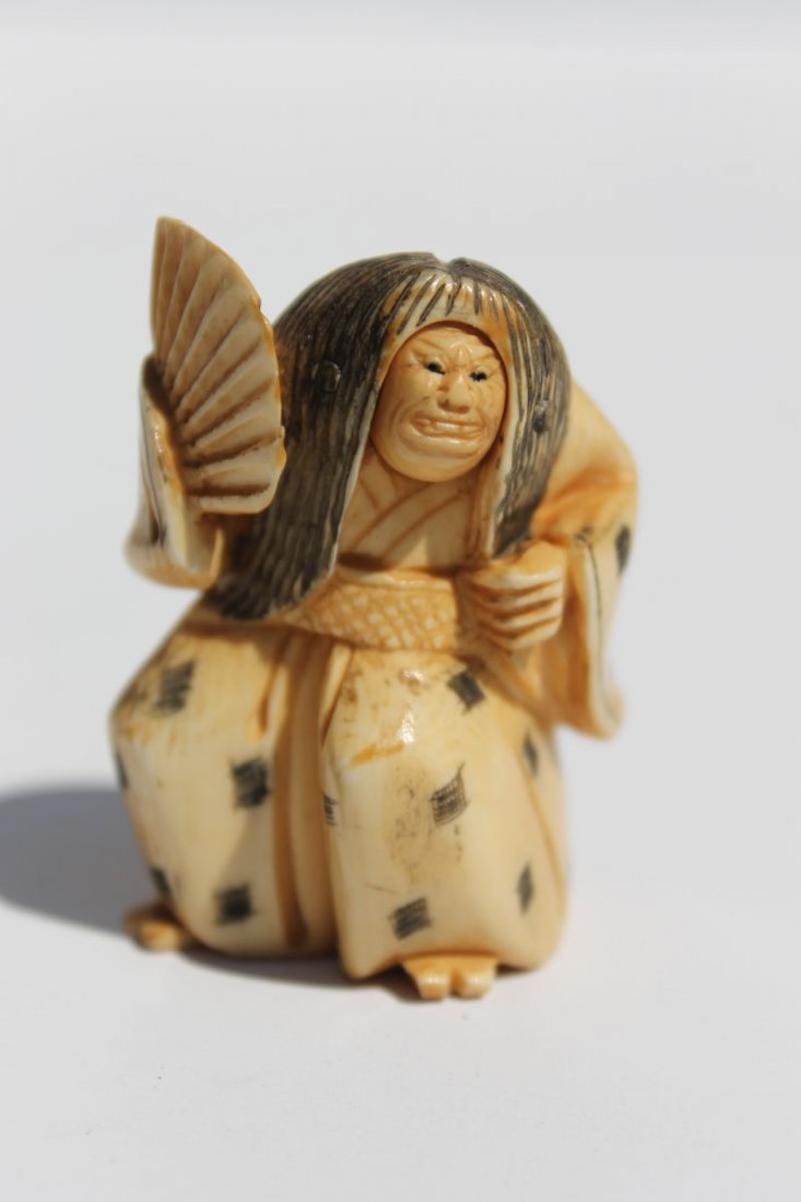 Asian carved ivory netsuke of a man w face & revolving: Asian carved ivory netsuke of a man w face & revolving face - 2" - sgnd