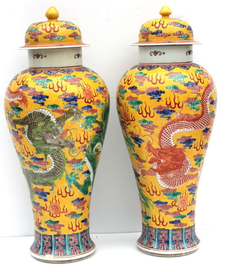 pr of early 20th C Chinese porcelain famille yellow: pr of early 20th C Chinese porcelain famille yellow covered jars/vases (few small chips to base) - 18" tall