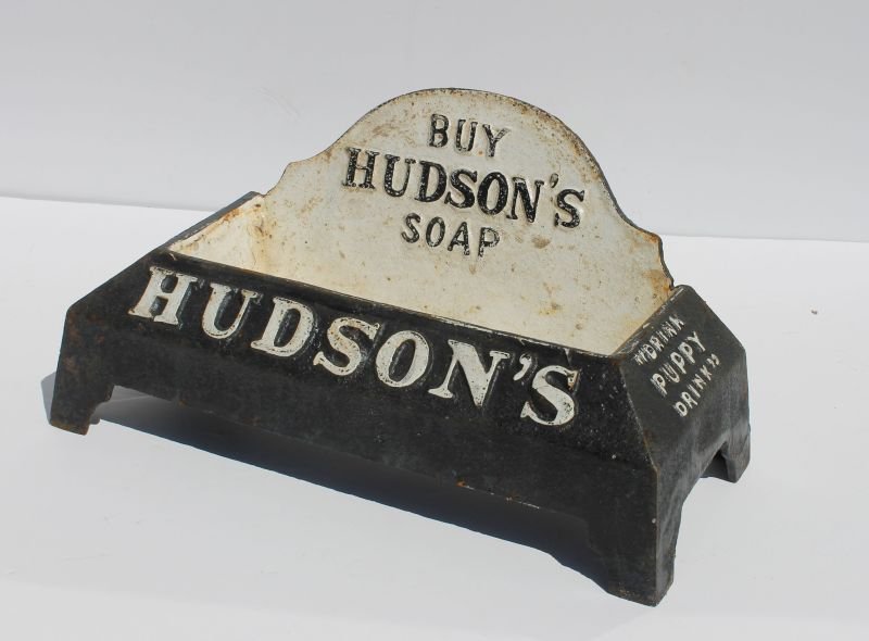cast iron "Buy Hudson's Soap" dog dish in orig black &: cast iron "Buy Hudson's Soap" dog dish in orig black & white paint - Note: says "Drink Puppy Drink" in raised painted letters on both sides - 18" wide x 7" deep x 8" tall