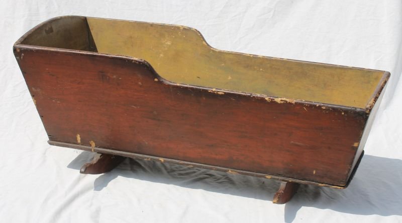 early 19thC New England cradle in old red paint w ochre: early 19thC New England cradle in old red paint w ochre color interior - 41" long