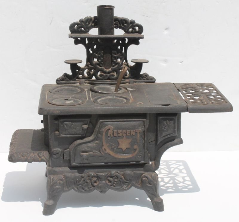 child's antique cast iron Crescent stove complete & all: child's antique cast iron Crescent stove complete & all orig - 11 1/2" tall x 13" wide