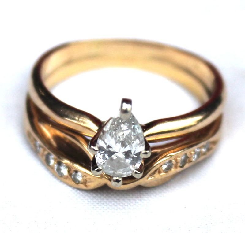 Beautiful 14k gold wedding set w pear shaped diamond: Beautiful 14k gold wedding set w pear shaped diamond ring & diamond channel set band