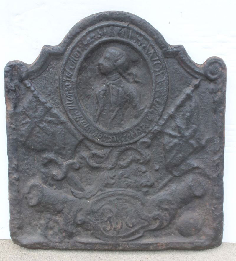 early American cast iron fireback depicting the: early American cast iron fireback depicting the portrait of General James Wolfe killed at the battle of Quebec in 1759 (Wolfe was a favorite English commander of American troops whose death at the tim