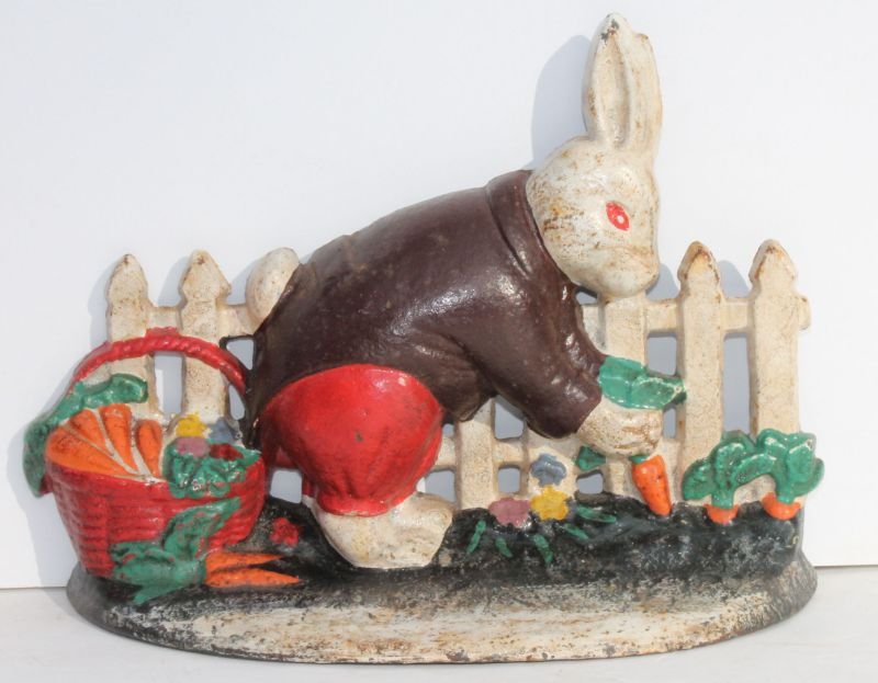 ca 1820-40 American cast iron vibrant ploychrome painte: ca 1820-40 American cast iron vibrant ploychrome painted rabbit in garden doorstop - 8 1/2" long
