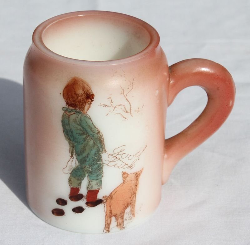 Handel opal ware match safe w loop handle hand painted : Handel opal ware match safe w loop handle hand painted w little boy peeing "Good Luck" into the snow w a pig at his side - striker bottom - 2 1/4" tall