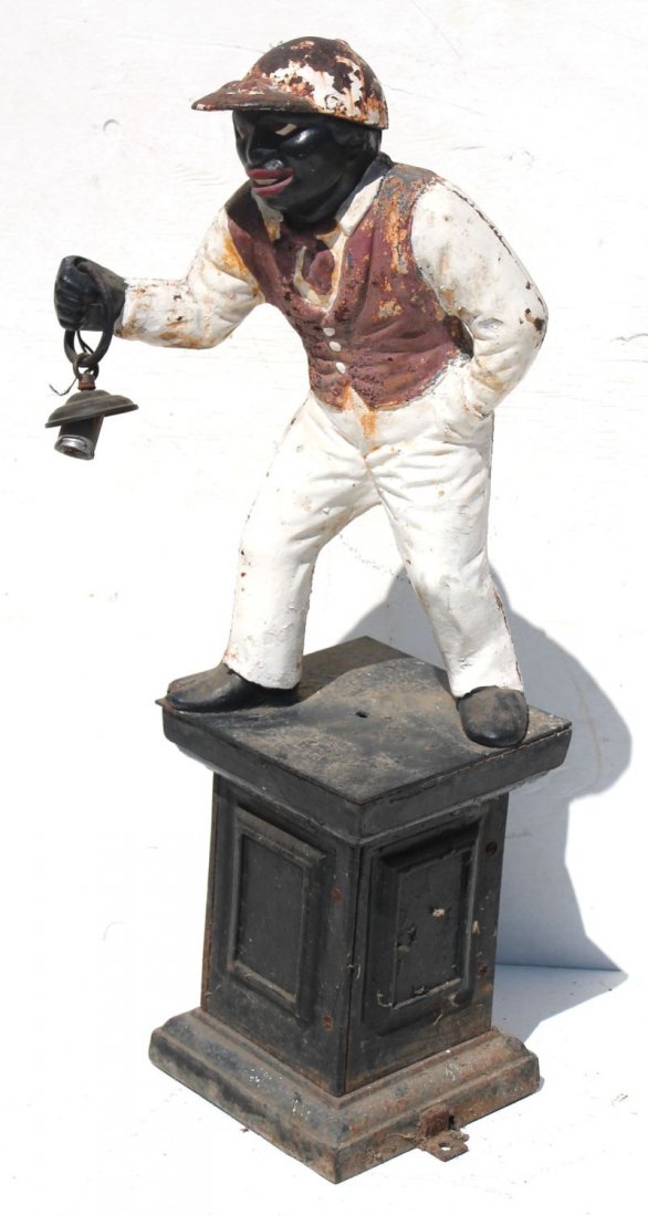 antique cast iron African American lawn jockey in old p: antique cast iron African American lawn jockey in old paint - from the Hatfield, MA estate - 37 1/2" tall