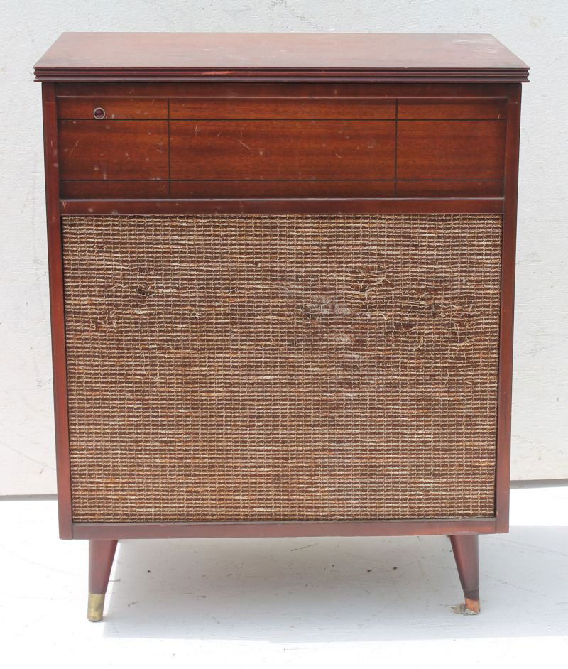 Travler floor model radio case w/Garrard record player: Travler floor model radio case w/Garrard record player inside- 29 1/2" tall x 23 1/2" wide x 15" deep